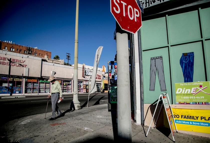 The corner of Mariposa Street and Beverly Boulevard shows a wide variety of services that cater to the Spanish speaking community including remittance services, a mobile store that provides pre-paid phone cards to communicate back home, an El Salvadorian market, and two general stores. 