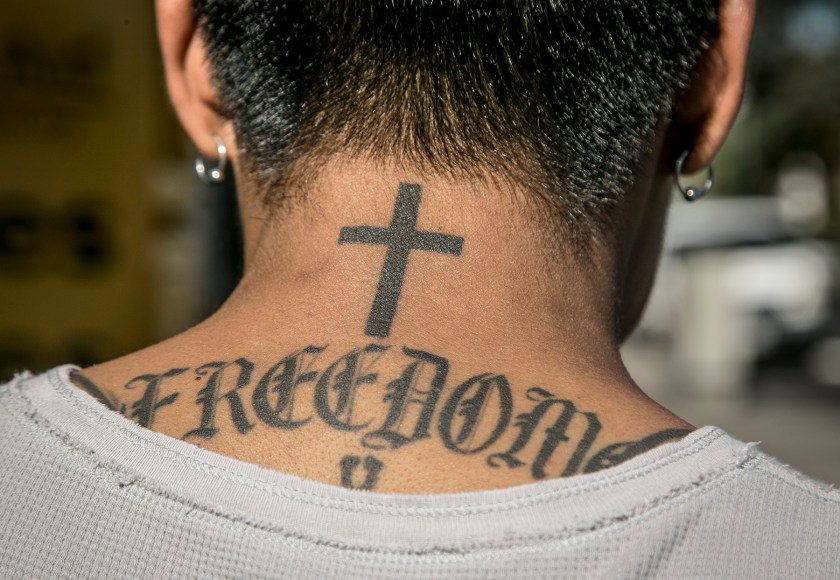 Xavier moved to Los Angeles 10 years ago from Mexico. He's lived in Koreatown for 8 years. He said the biggest changes he said he had seen were more Latinos. On 3rd Street where he gets his hair cut, he said most of the Latinos there are from El Salvador, so people walking by will see many papusa restaurants. He said he wouldn't change anything about the area, and that it's perfect as it is. The police provide security for people there. His tattoo represents what he wants: to feel free to be whoever he wants to be, unlike when he was living in Mexico